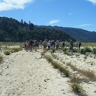 Discussing the unique approach to dune planting at Marahau