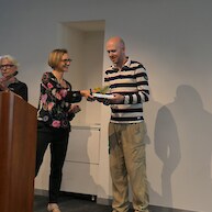 Laura Shaft (CRT Chair) thanking Prof Petterson and Graham Hinchliffe with a beautiful pīngao putiputi and craft chocolates